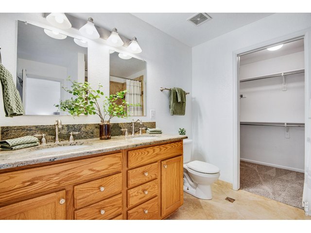 Property Photo 28 Loaded with generous vanity space and a walk in closet.