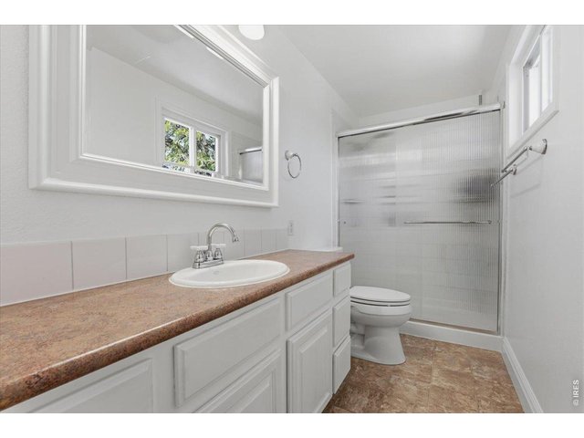 Property Photo 13 Primary bath with walk-in shower