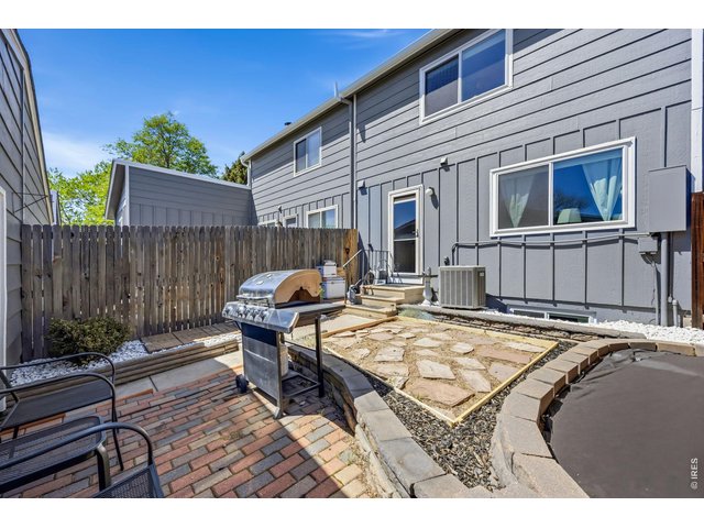 Property Photo 18 Backyard Patio Area