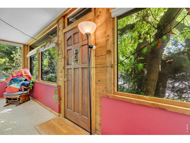 Property Photo 6 south facing sunroom