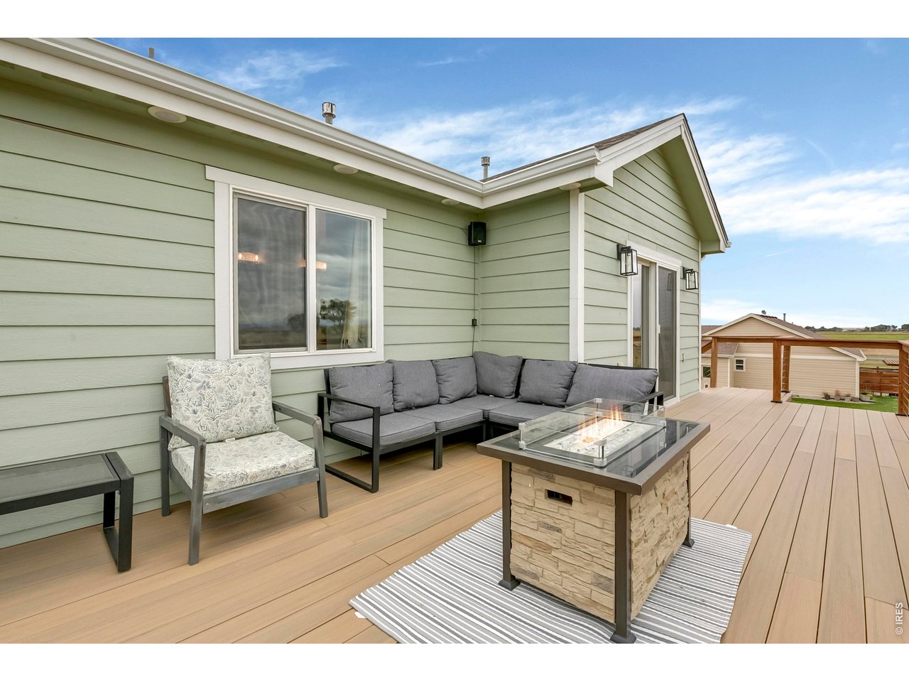 Relax and unwind on the deck off of the primary suite
