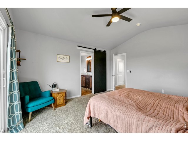 Property Photo 20 Farmhouse style barn door and 5 pc bath