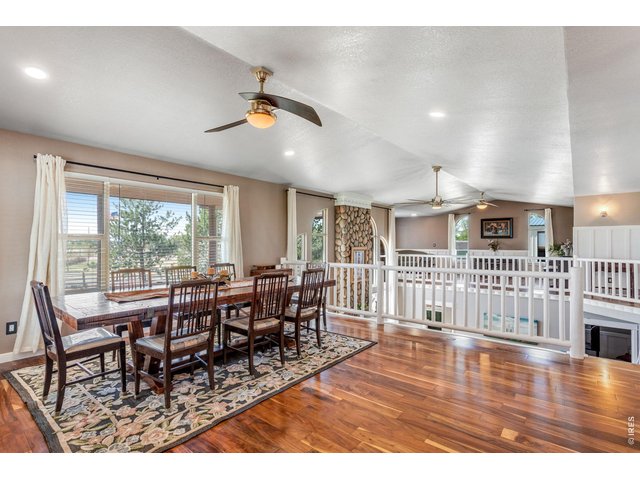 Property Photo 2 As you walk into the home, the dining room is to your left with a large window giving you western views.
