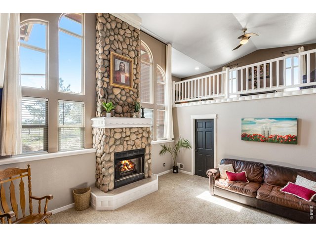Property Photo 19 Family Room - Through that door is Bedroom 3. Living room up above on the upper level.