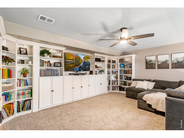 Property Photo 23 Den area - wrap around built-in shelving