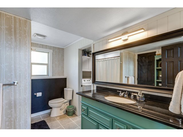 Property Photo 30 Primary bath connects to laundry and family room