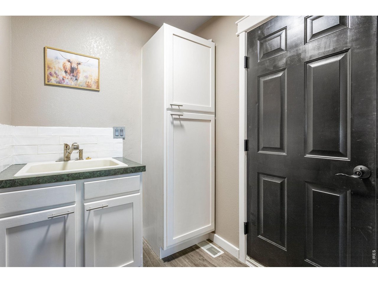 Mudroom leading to the garage from the kitchen