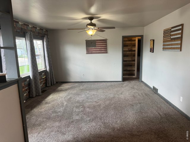 Property Photo 4 Spacious Living Room