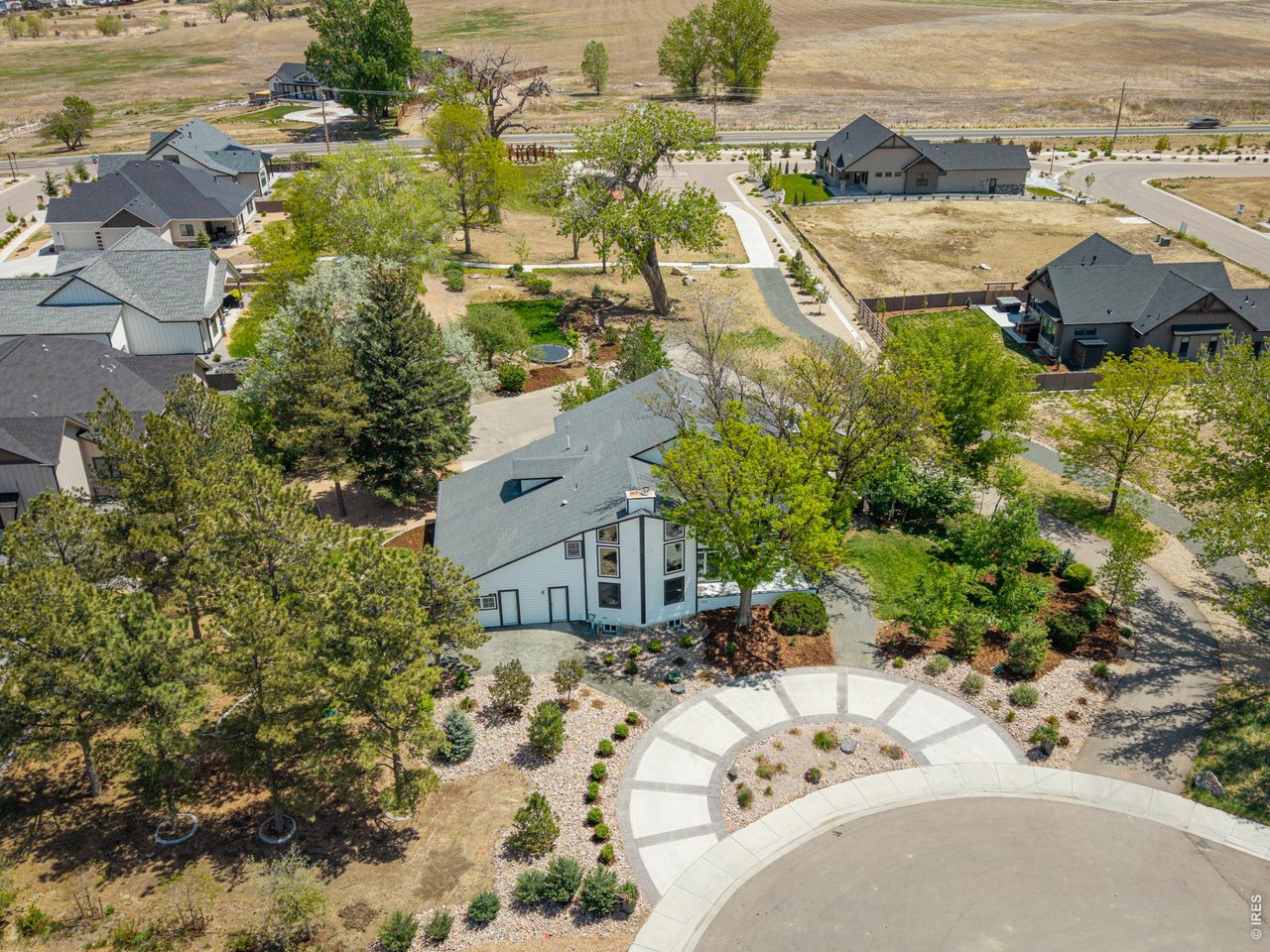 The private 1.02 acre lot backs to open space for even more privacy.