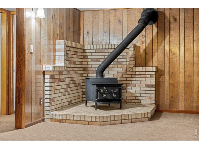 Property Photo 37 The wood burning fireplace makes this space extra cozy!
