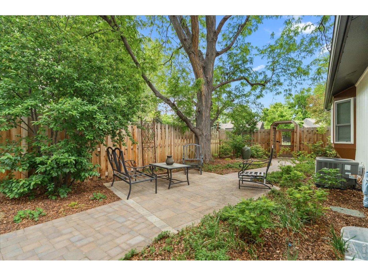 Xeriscaped backyard with sprinkler drip system. 2 year old fence! 