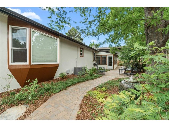Property Photo 42 Brick walkway through the backyard. Water fountain not included! 