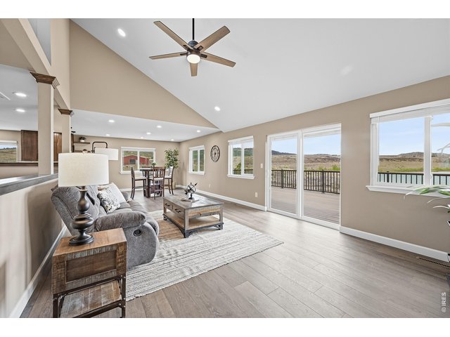 Property Photo 6 Living room with astounding views of the Lake!