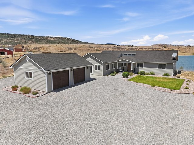 Property Photo 1 Oversized 2 car garage with additional storage. Remodeled home on nearly 8 acres!
