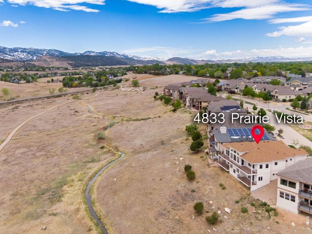 Property Photo 47 Low-Maintenance Luxury Lifestyle Property, Prepare to be blow-away by these views, as far as the eye can see panoramic unobstructed Foothill + Prairie Views, backing to the Cathy Fromme, a nature lover's paradise! 