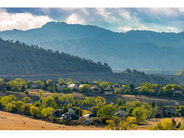 Property Photo 34 Views from the backside! Horsetooth Rock, far southwest Fort Collins in the private enclave of Harmony Ridge, tucked at the back of the cul-de-sac, enjoy over an 180 degree span of unobstructed views! 