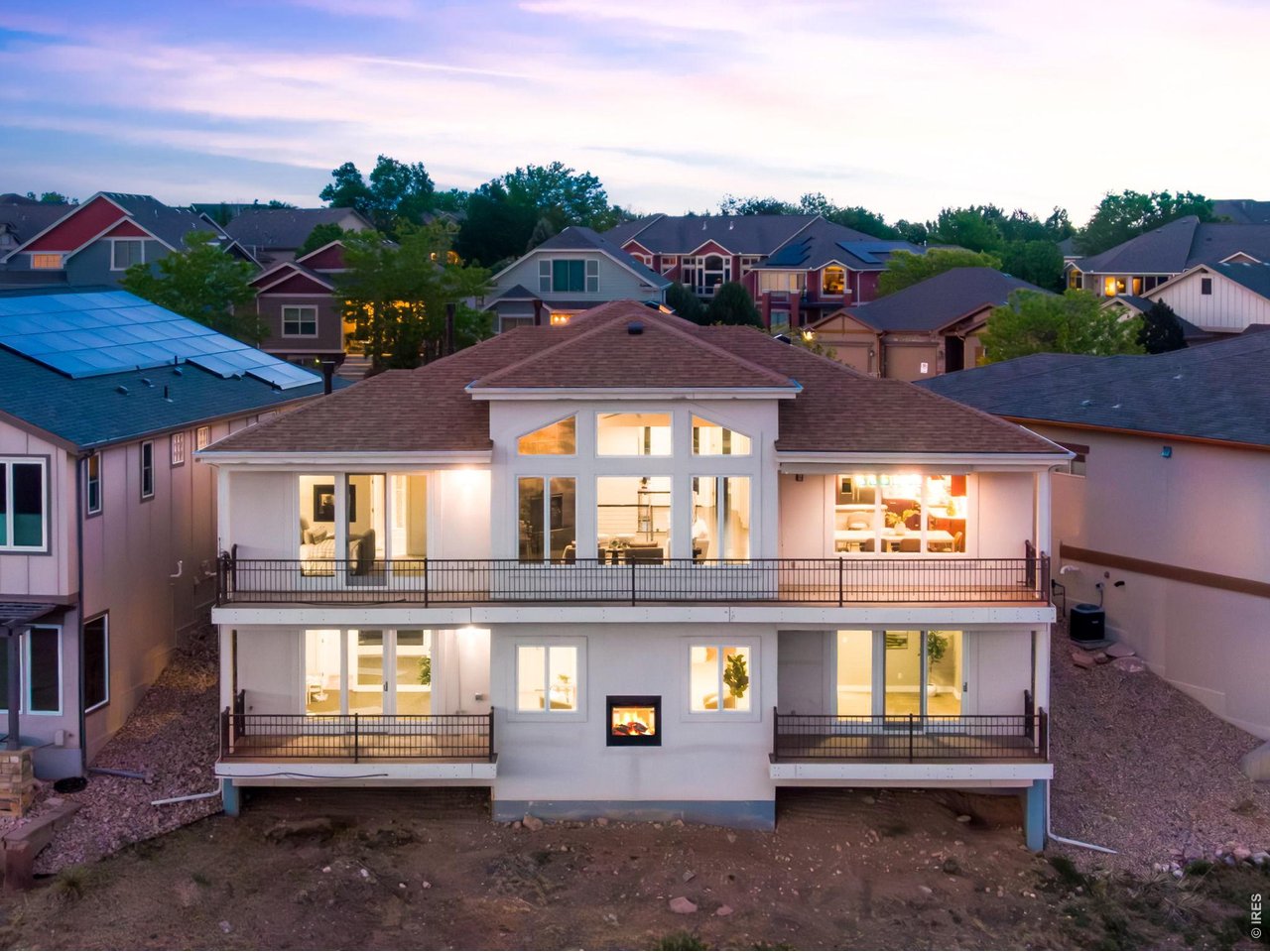 3 fireplaces, Custom Patio Home- stucco and stone and custom welded rails, 4 covered decks. 