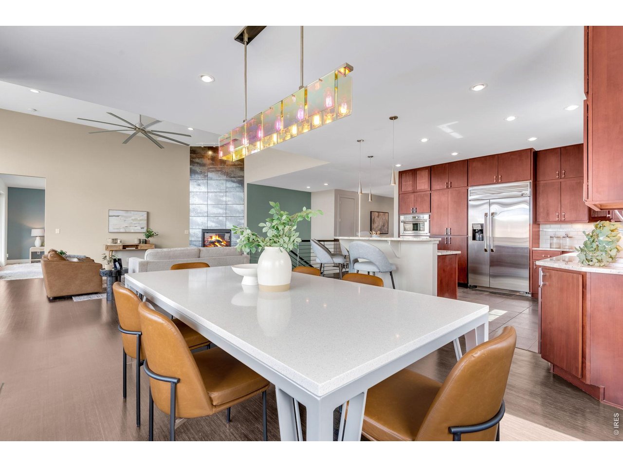 Included dining room table custom made just for this incredible space and matches the rails on the floating stairs! 