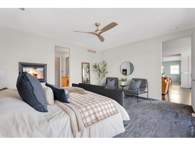 Property Photo 7 Dual sided fireplace, cozy custom plush carpet and pad! 