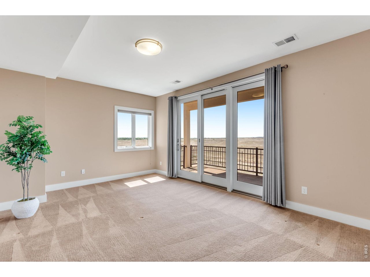 Finished Lower Level Spacious suite at 16 X 12 with its own deck and triple glass slider! 