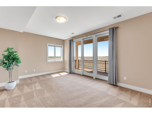 Property Photo 44 Finished Lower Level Spacious suite at 16 X 12 with its own deck and triple glass slider! 