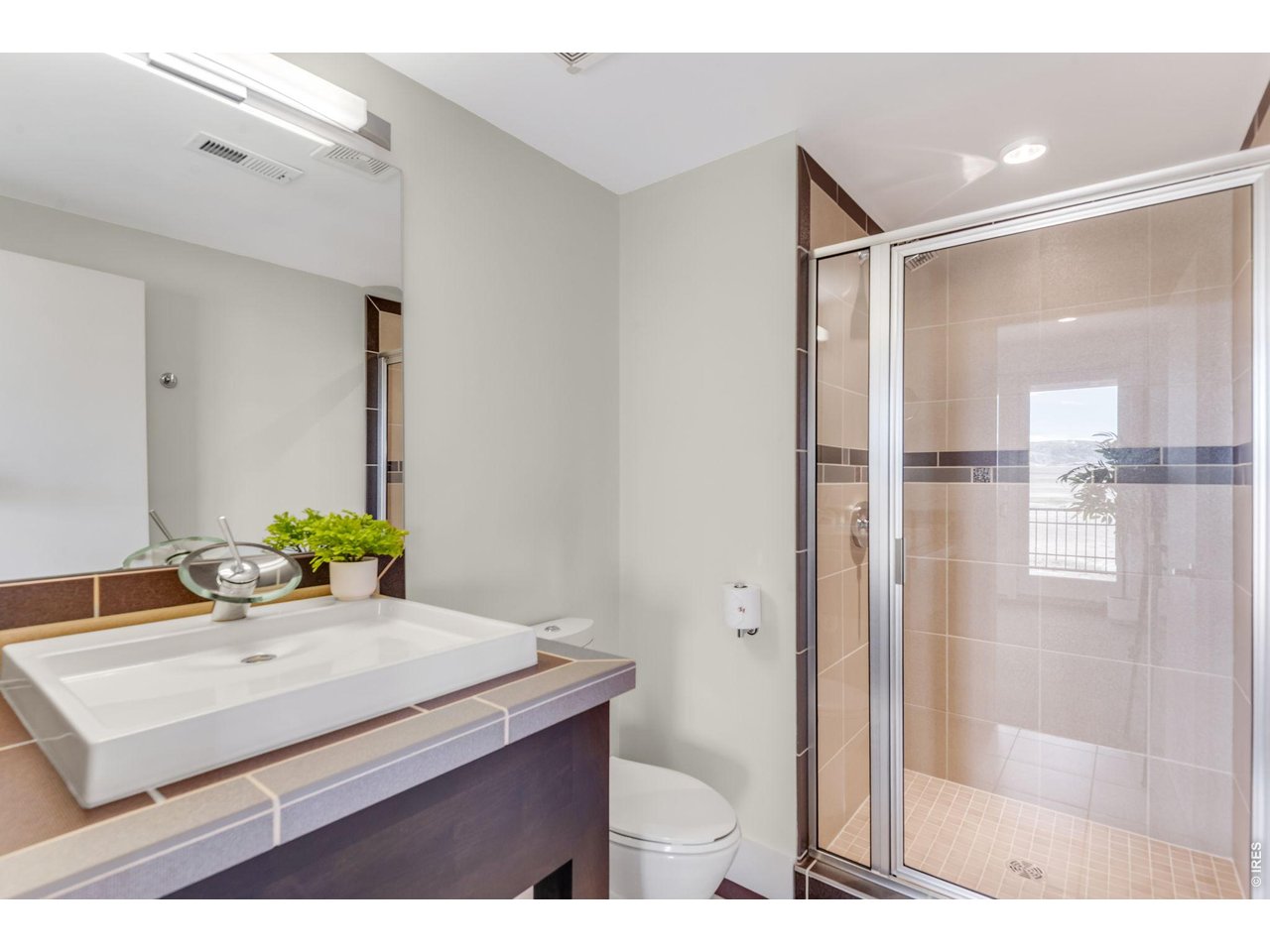 Additional 3/4 Bathroom in the finished lower level. Great suite for a guest stay or work-out area, yoga flexpace. 