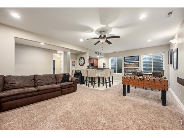 Property Photo 20 Canned Lighting, Tall Ceilings and Deep Windows Allow this Space to Feel Open and Bright!
