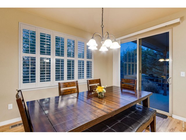 Property Photo 13 Dining area/breakfast nook with dimmer switch and patio access 