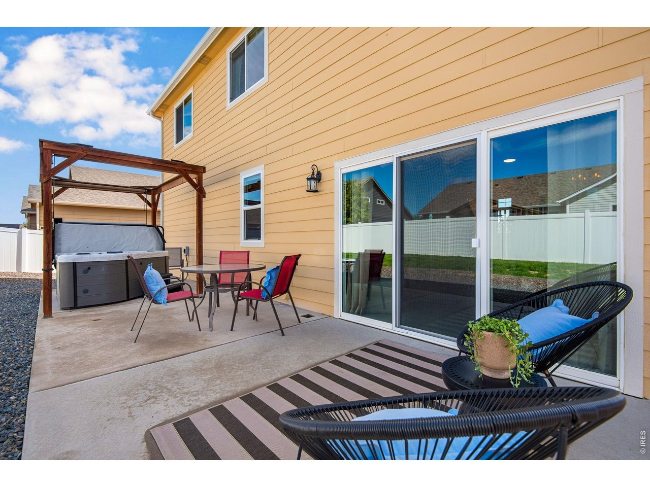 300 SQFT Expansive Patio, Hot Tub included, and triple glass slider off the living room!
