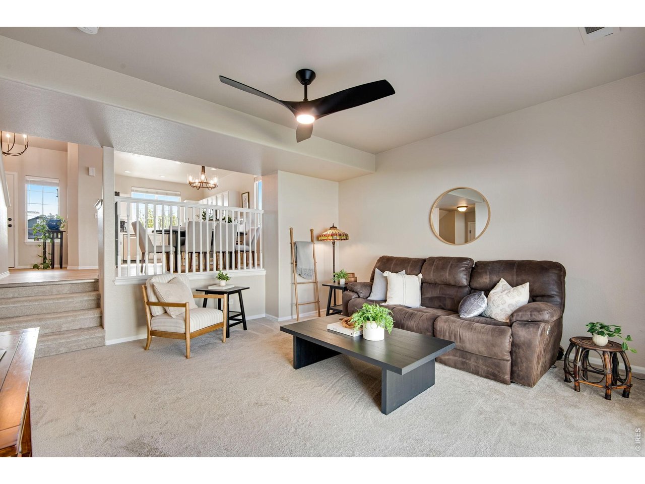 Comfortable Living Room space, upgrade ceiling fan, plush new carpet and pad, fresh paint - spacious & fresh! 