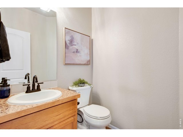 Property Photo 14 Powder Bathroom, newer faucet, lighting and comfort height toilet. 
