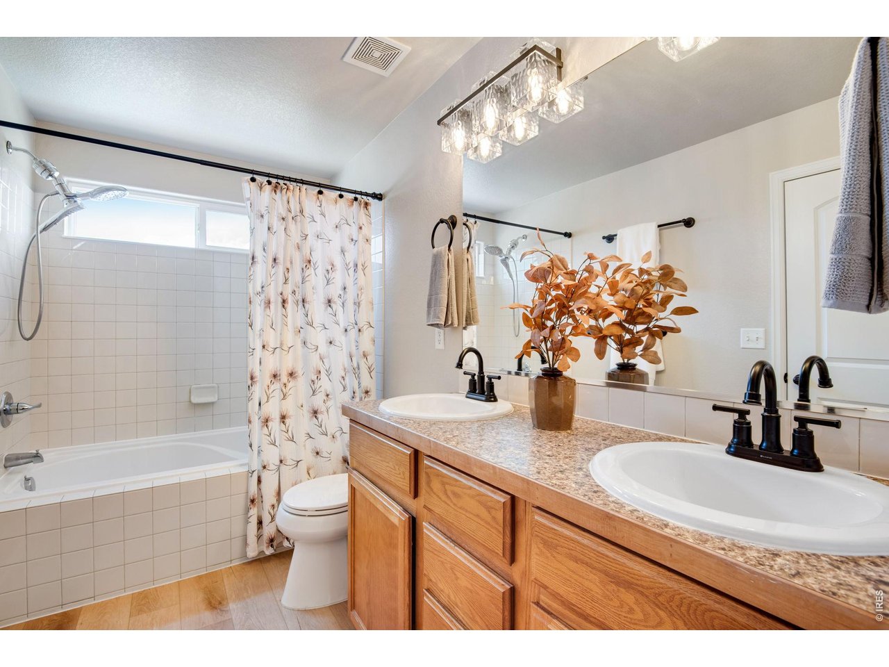 Primary Full Bathroom Suite, new LVP floors, new faucets, and lighting, paint and - 36" taller vanity sinks and comfort height toilet! 