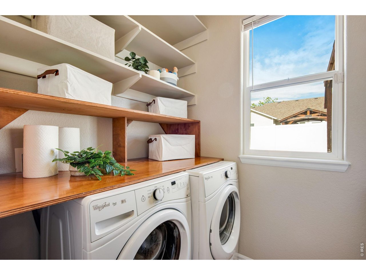 Washer and Dryer included- great shelving and storage and separate folding table. 