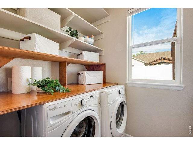 Property Photo 36 Washer and Dryer included- great shelving and storage and separate folding table. 