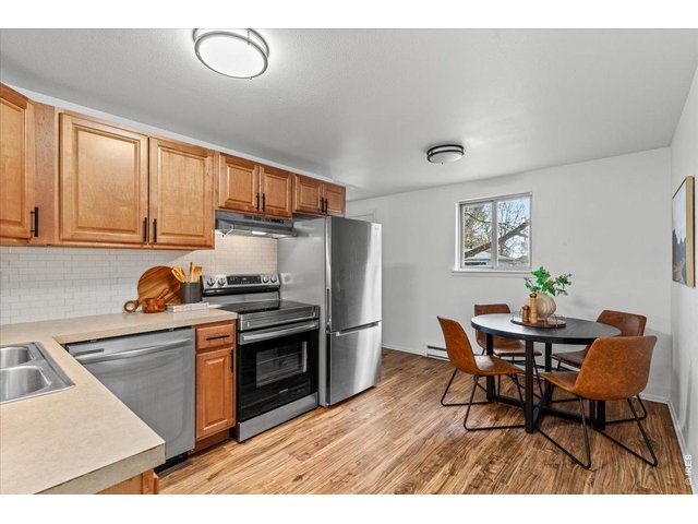 Property Photo 10 Stainless Steel appliances in the kitchen