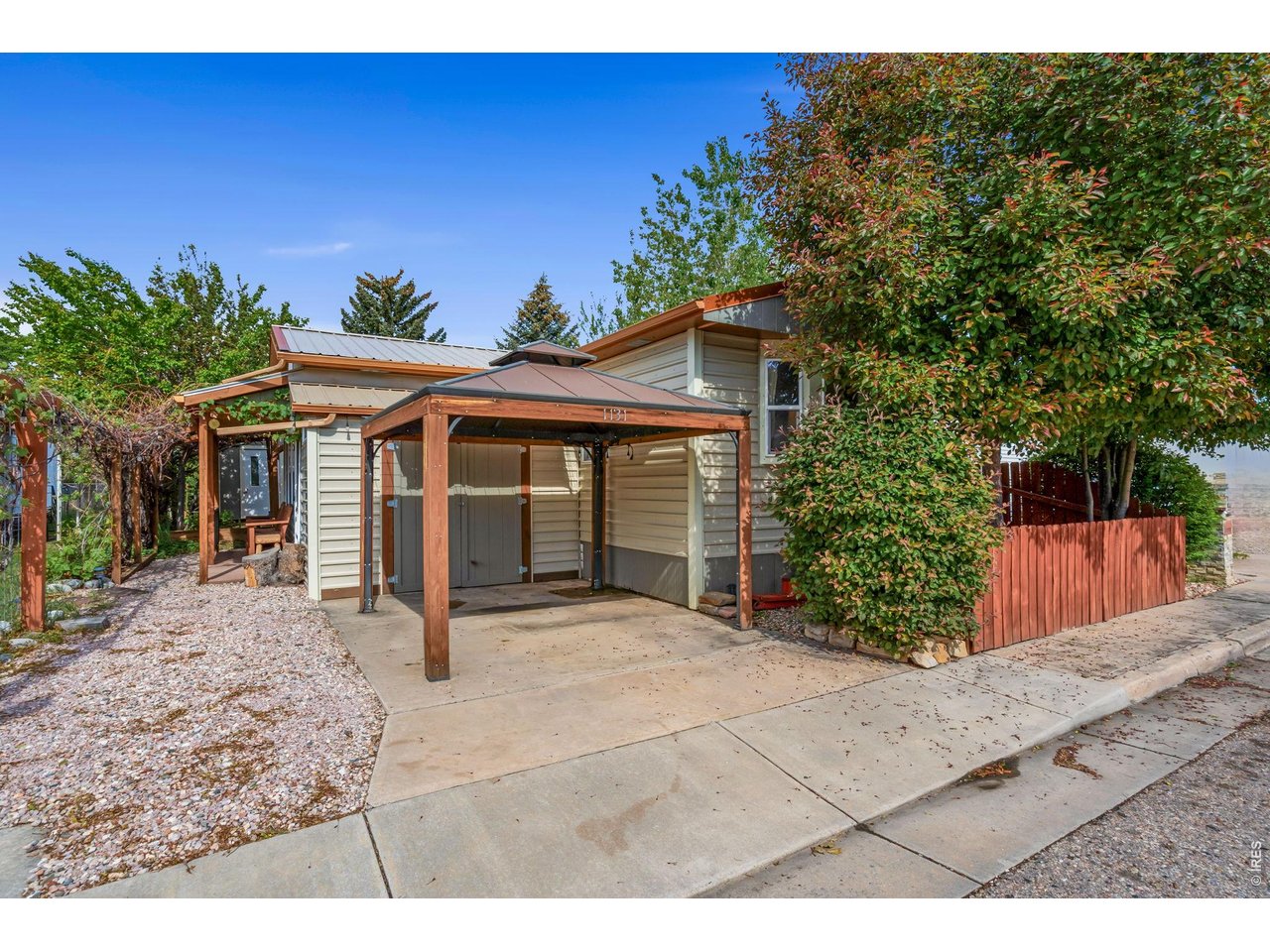 Welcome to 1131 Caroline Ct. Work shop under carport.