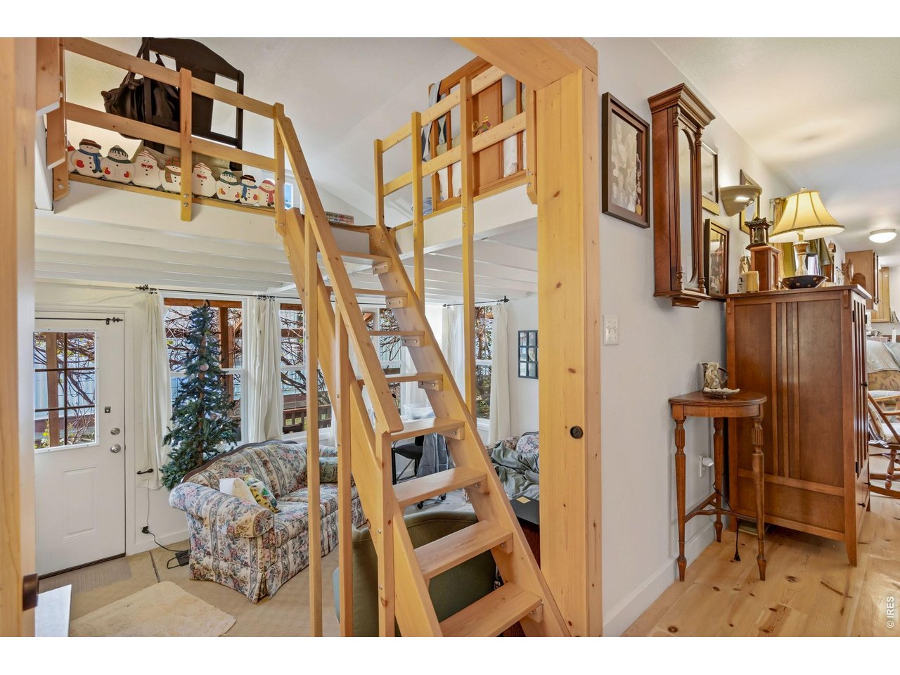 Steps up to loft above study/den.