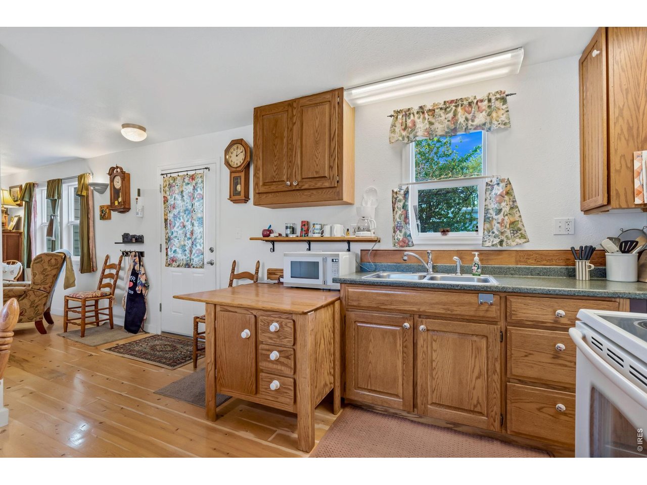 Kitchen opens to living room.