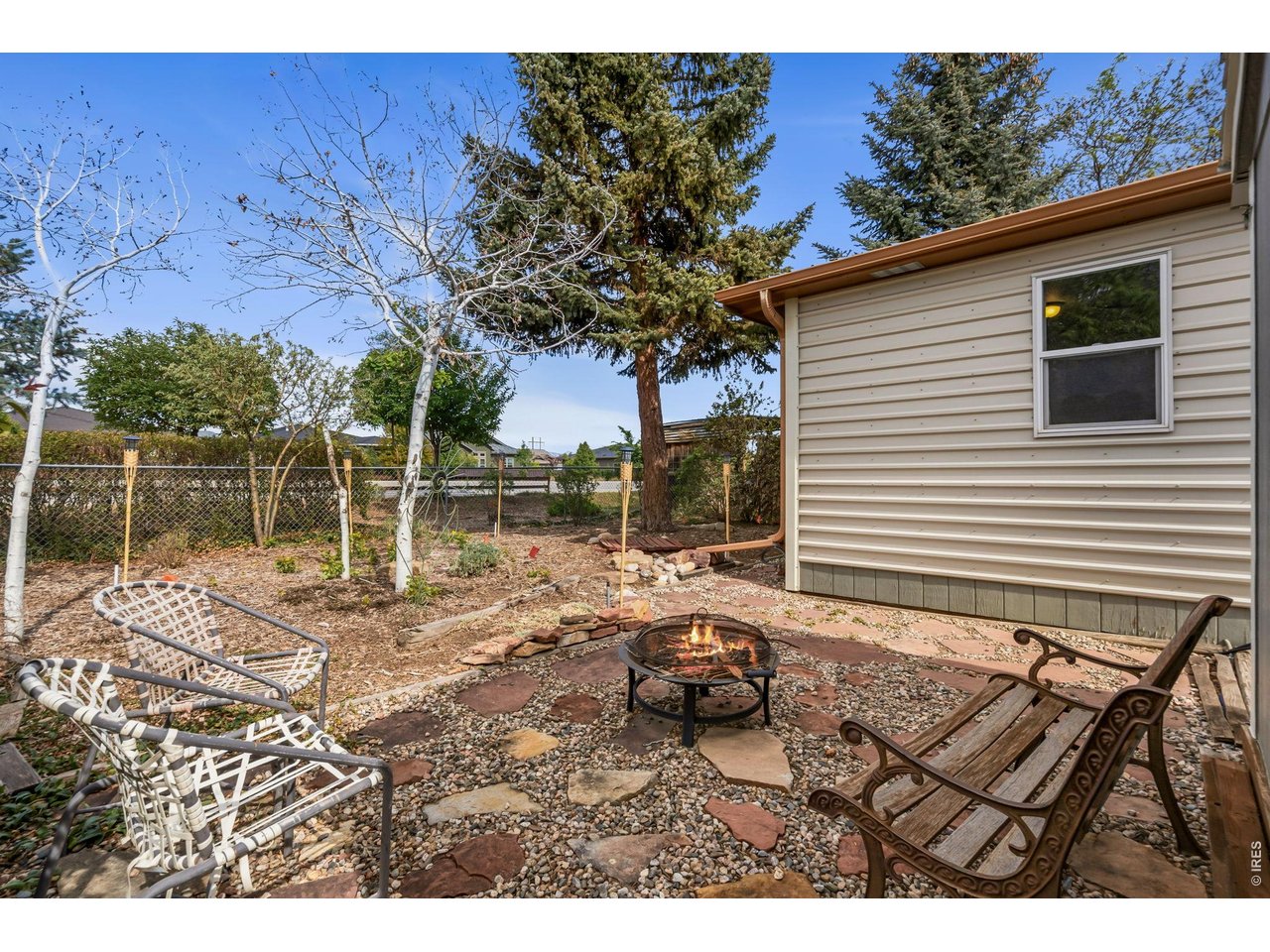 Fire-pit area on the back side of the home.