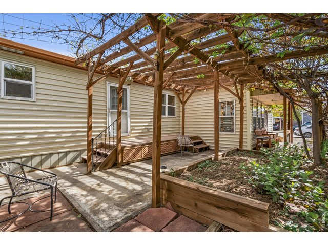 Property Photo 26 Covered pergola area accessed off the kitchen.