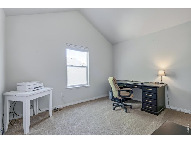 Property Photo 15 Second bedroom - also a large room with cathedral ceilings. 