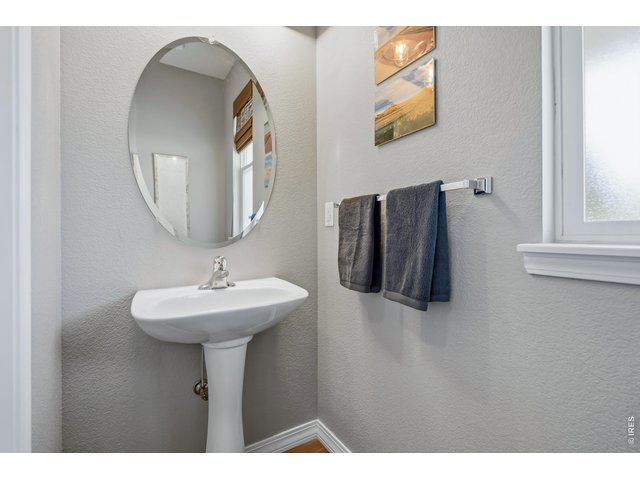 Property Photo 18 Half bath on main floor. East facing window.
