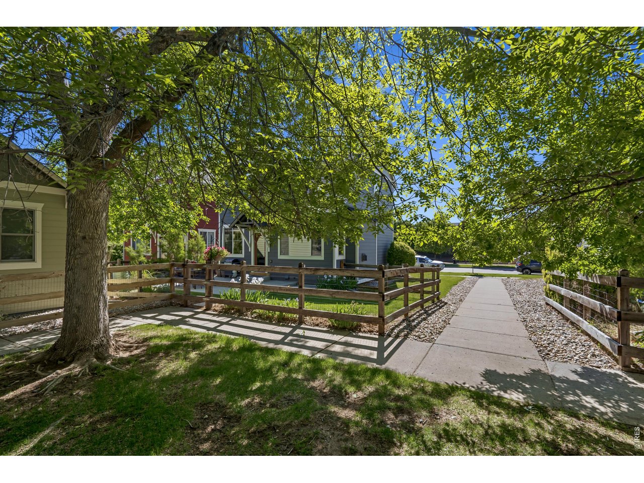 Walk way on south side of home provides lots of separation. 