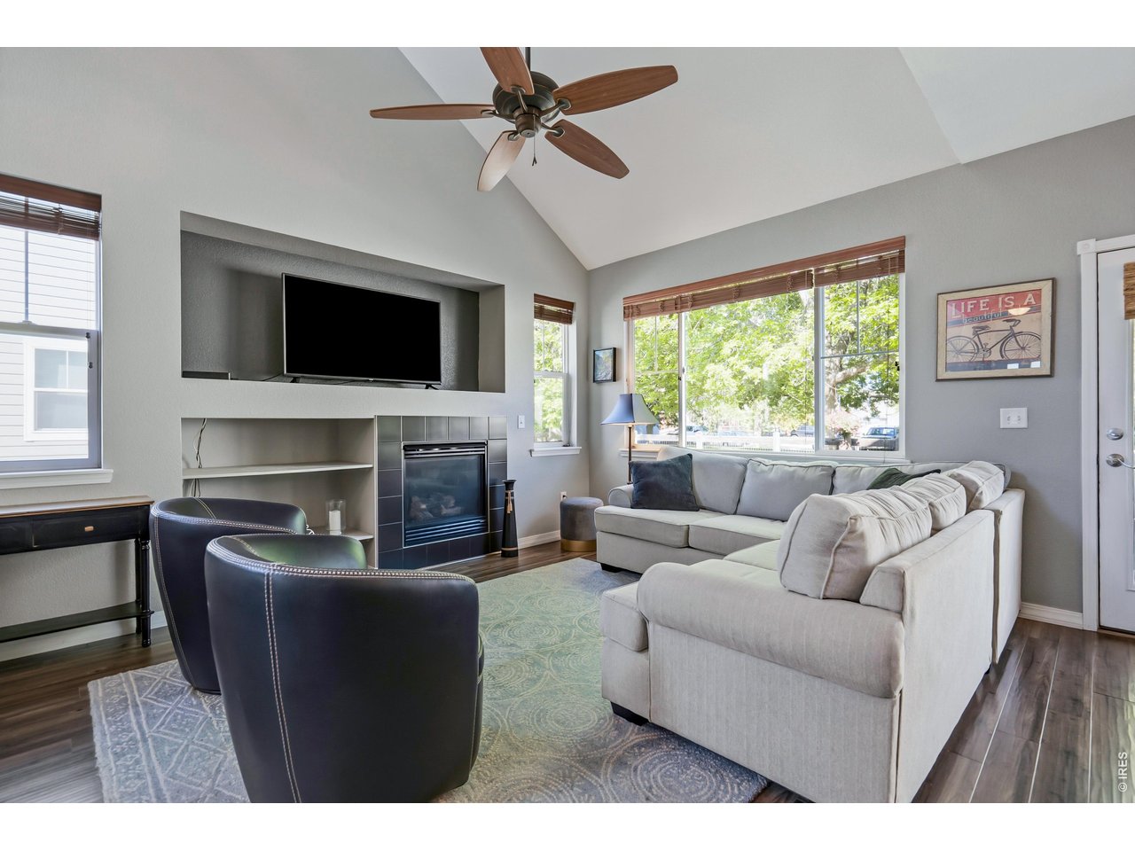 Living room with large west facing window.