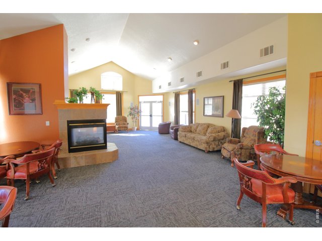 Property Photo 20 Spacious seating area in the clubhouse for entertaining, dining and relaxing.