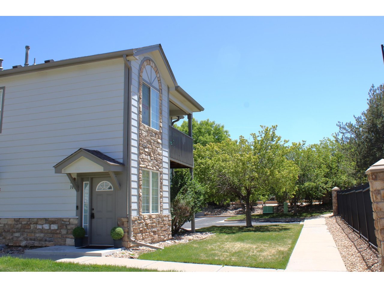 Main level entry with attached one car garage with inside access. Unit above garage.
