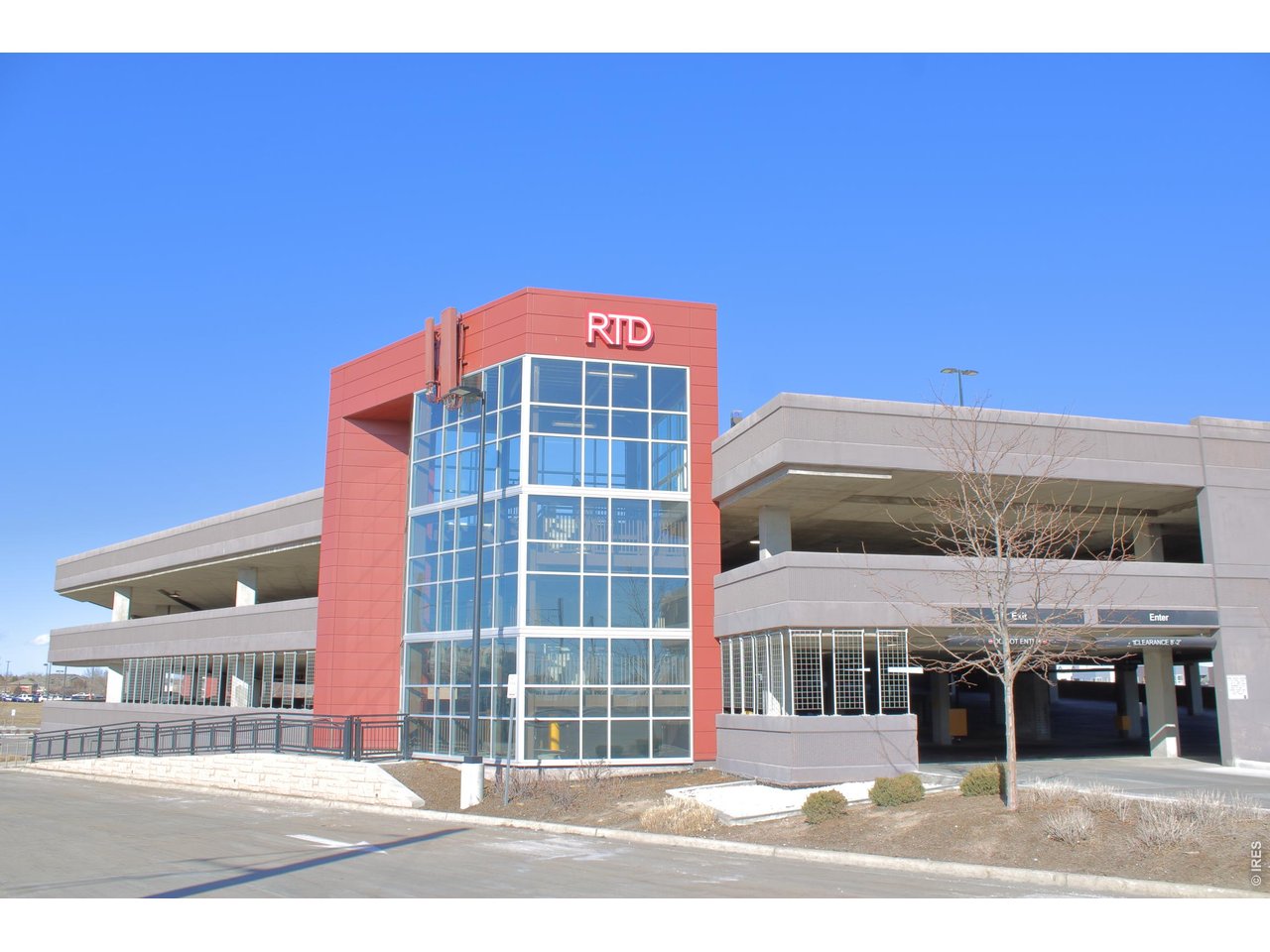 Large RTD commuter center with big parking garage, buses and light-rail trains just a few blocks away.