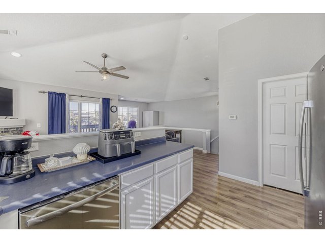 Property Photo 11 Laundry room just off the kitchen, vaulted ceilings, ceiling fans.