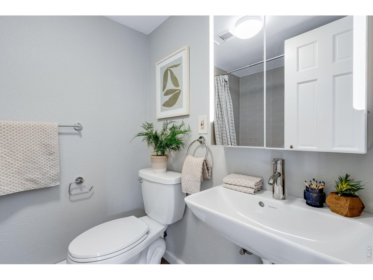 Updated Bathrooms - duravit sink, backlit mirror updated tile work in both showers.