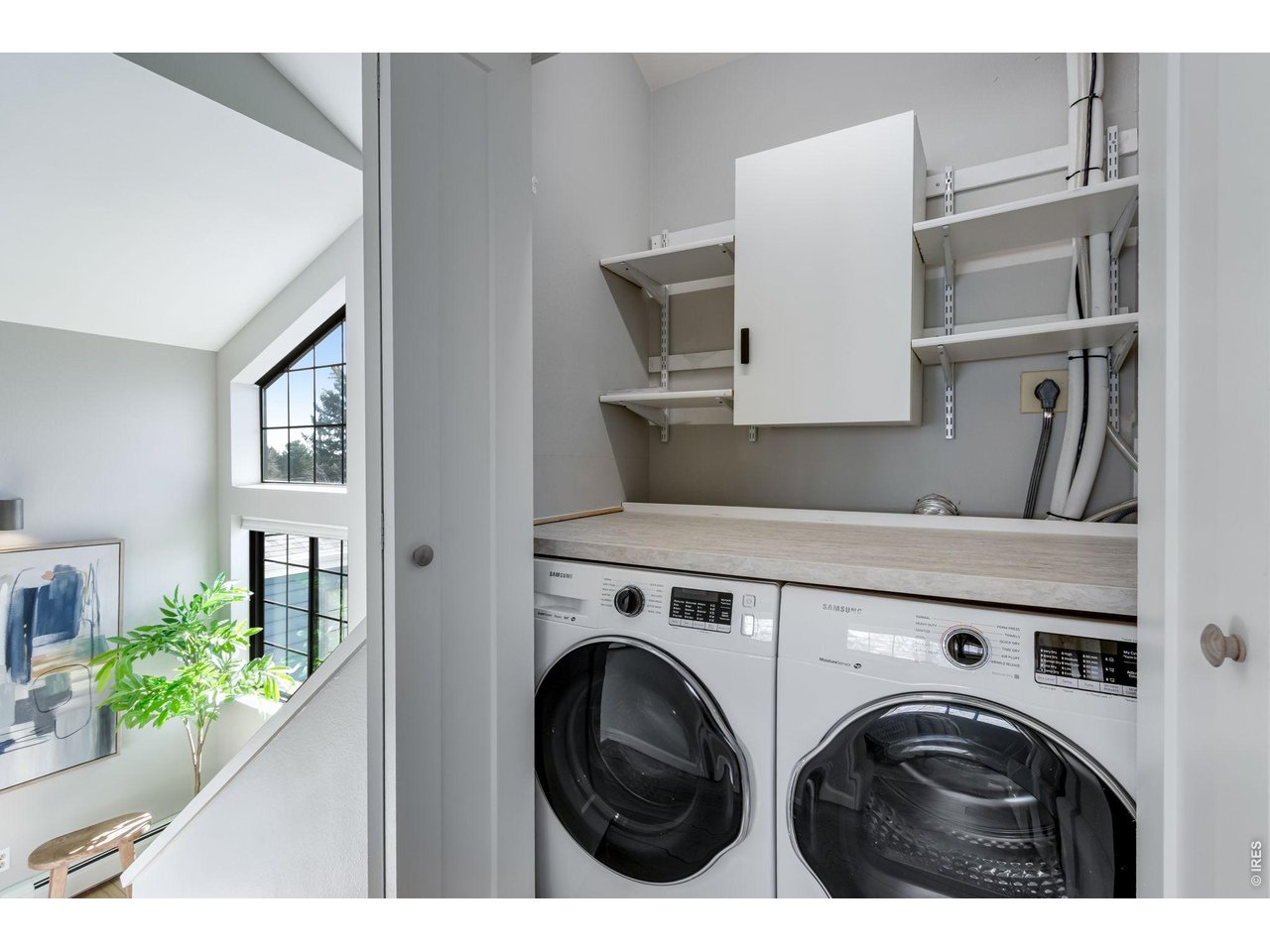 Newer Samsung Washer & Dryer conveniently located next to the primary suite!